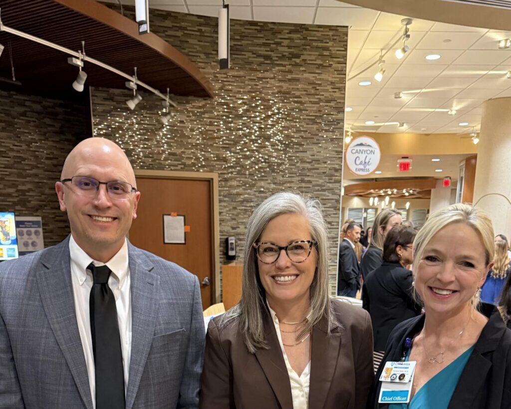 Dr. Jonathan and Dr. Darlene Melk meeting with Gov Hobbs at the state of the state address