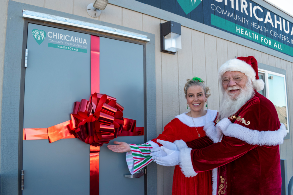 Santa and Mrs. Claus giving clinic to Willcox. CCHCI